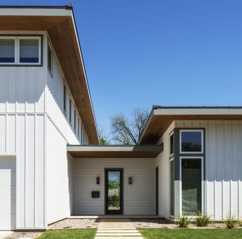 https://meexteriorsolutions.ca/wp-content/uploads/2023/11/HardiePanel-Vertical-Siding.jpg